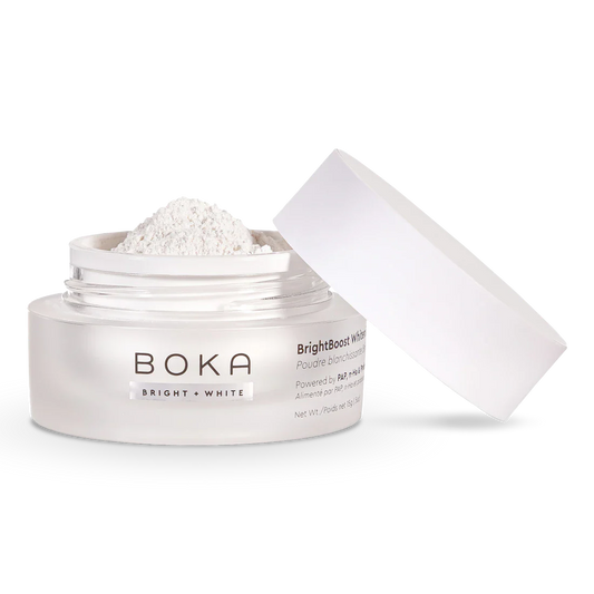 Boka BrightBoost Whitening Powder in open jar with white lid.